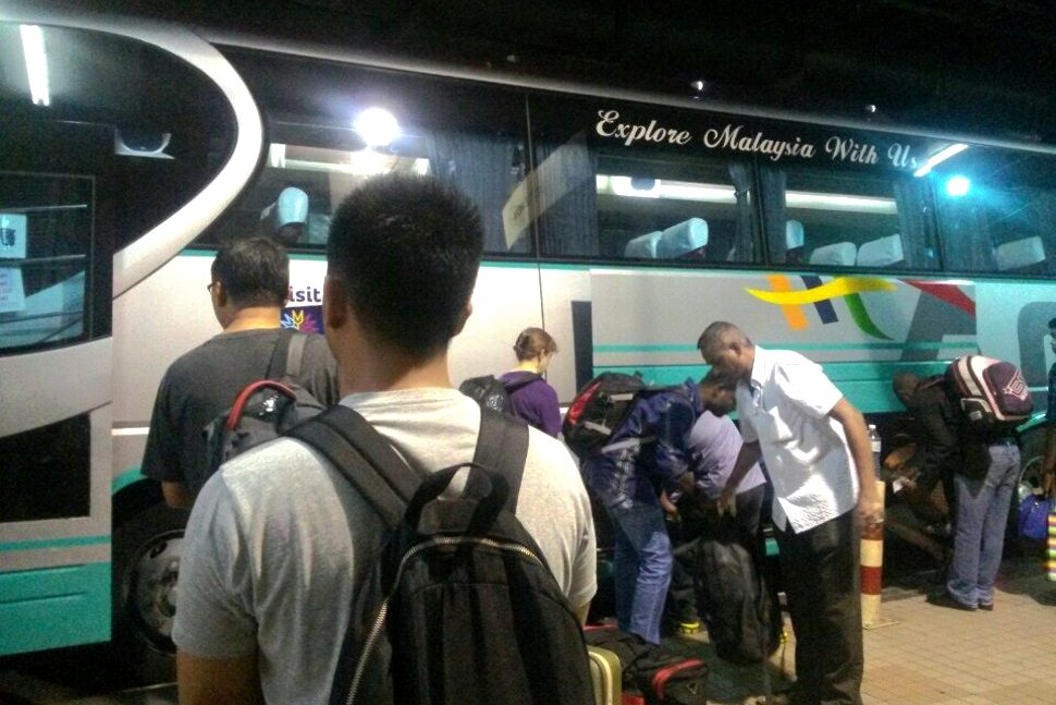 Passengers boarding the Airport Coach