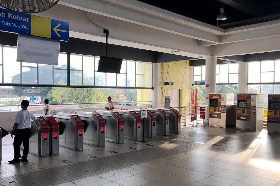 Faregates and ticket vending machines at station