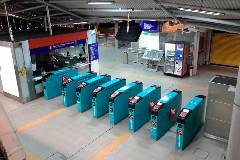 Faregates and customer service office at station