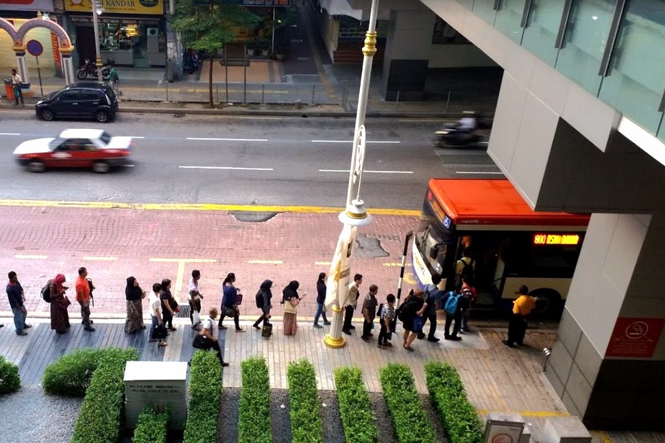 Commuters queuing up for the bus