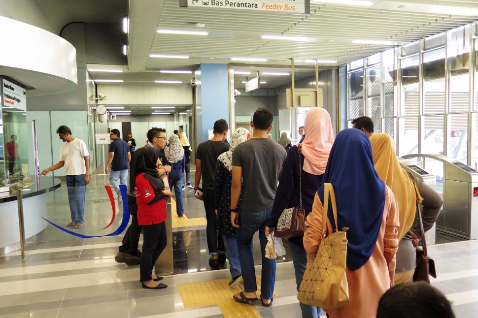 Commuters exiting the Bandar Utama station