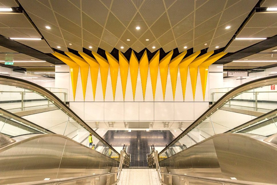 The ceiling above the escalator is decorated with 14-pointed star on the flag of Malaysia (Jul 2017)
