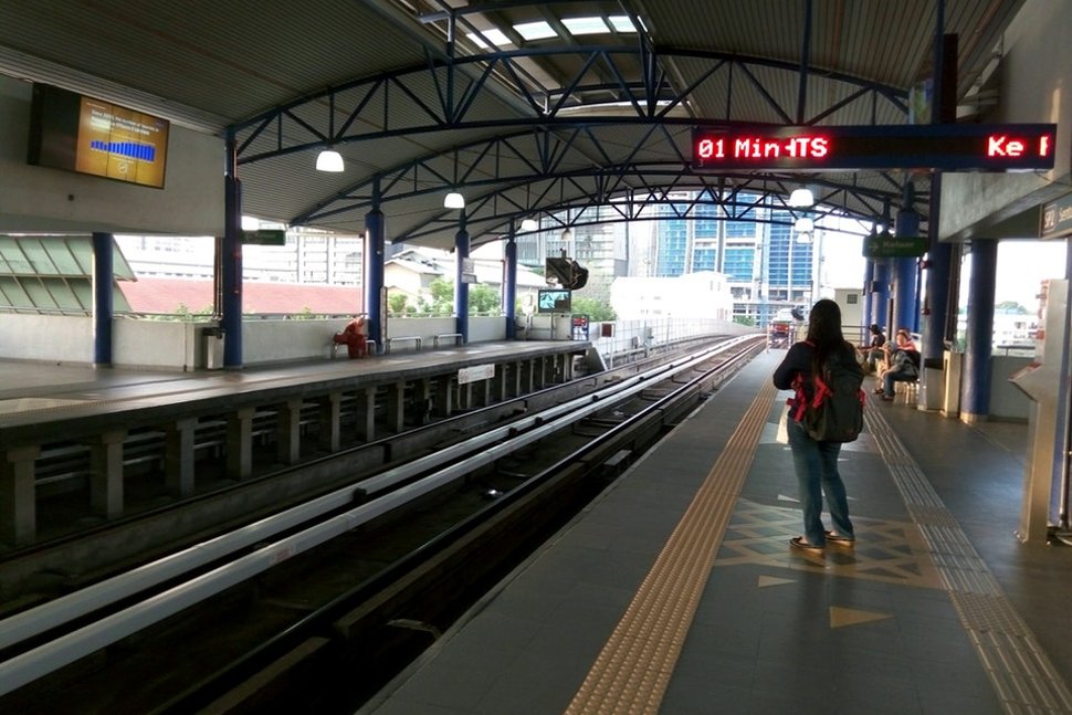 Commuters waiting for train at the platform