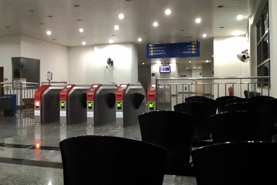Faregates and waiting area at the station