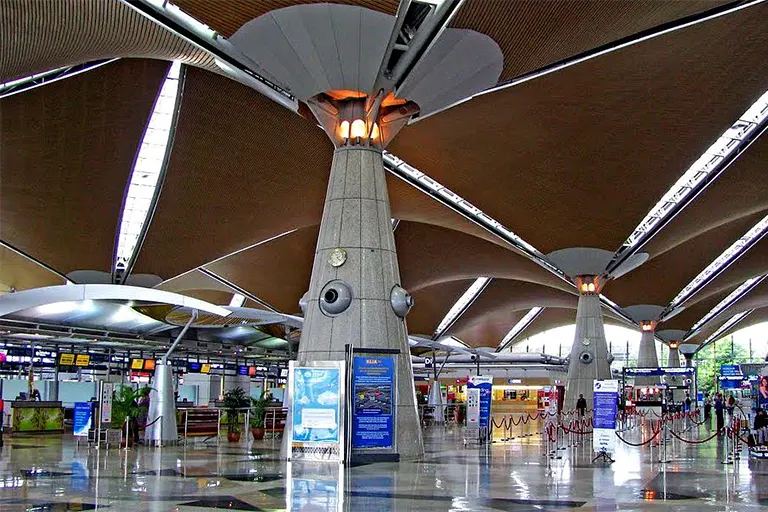 Check-in counters and luggage drop area on Level 5