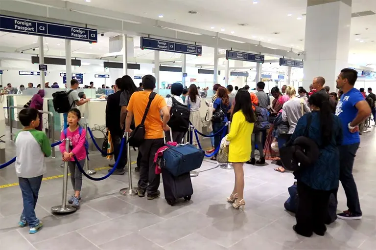 Travelers queuing up for the Immigration checks at the Arrival Hall