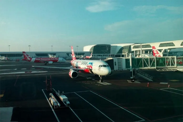 View of AirAsia flights from the gate J