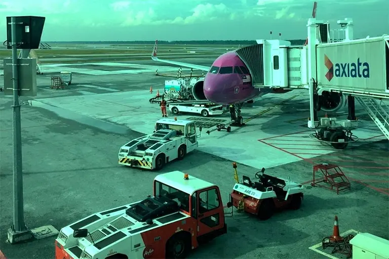 View of AirAsia flight connected to Aerobridge from Pier L
