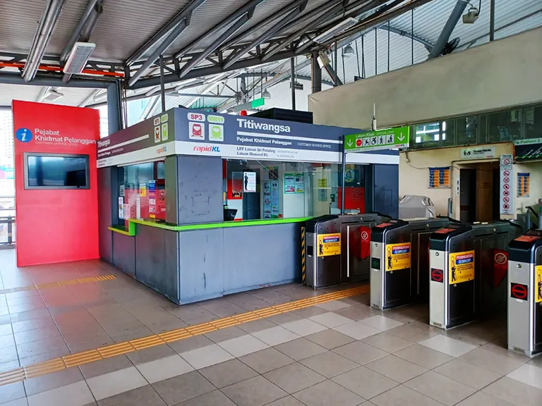 Customer service office and faregates at the Titiwangsa Monorail station